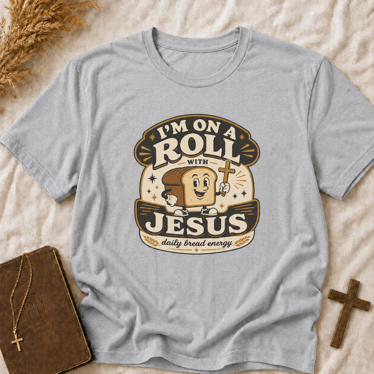 T-Shirt — “I’m On a Roll with Jesus” Graphic Tee (Bread & Cross Vintage Christian Design)