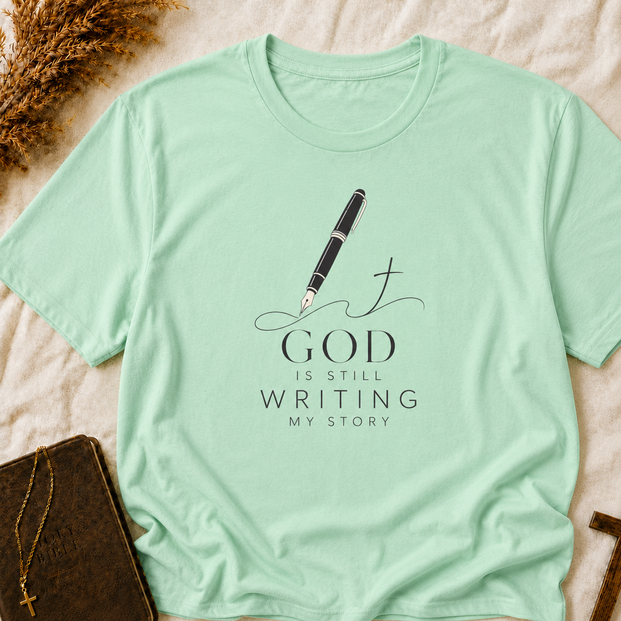 Faith Pen T-Shirt — “God Is Still Writing My Story” Christian Graphic Tee